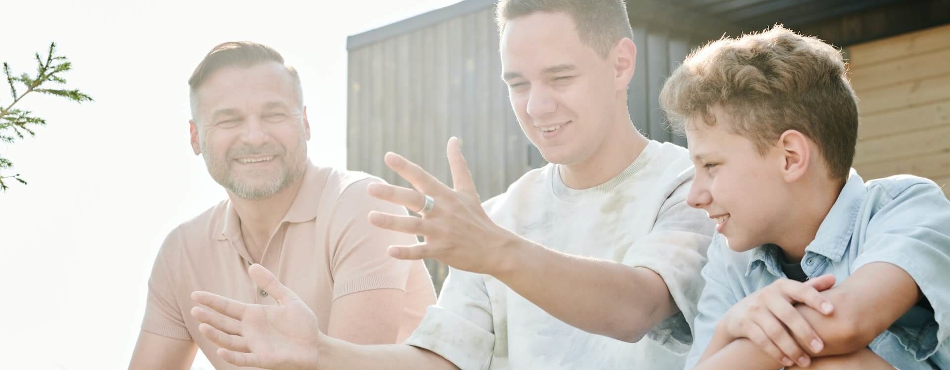 Dad talking with sons